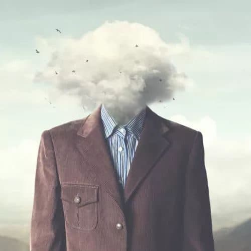Figure whose head is obscured by a low cloud