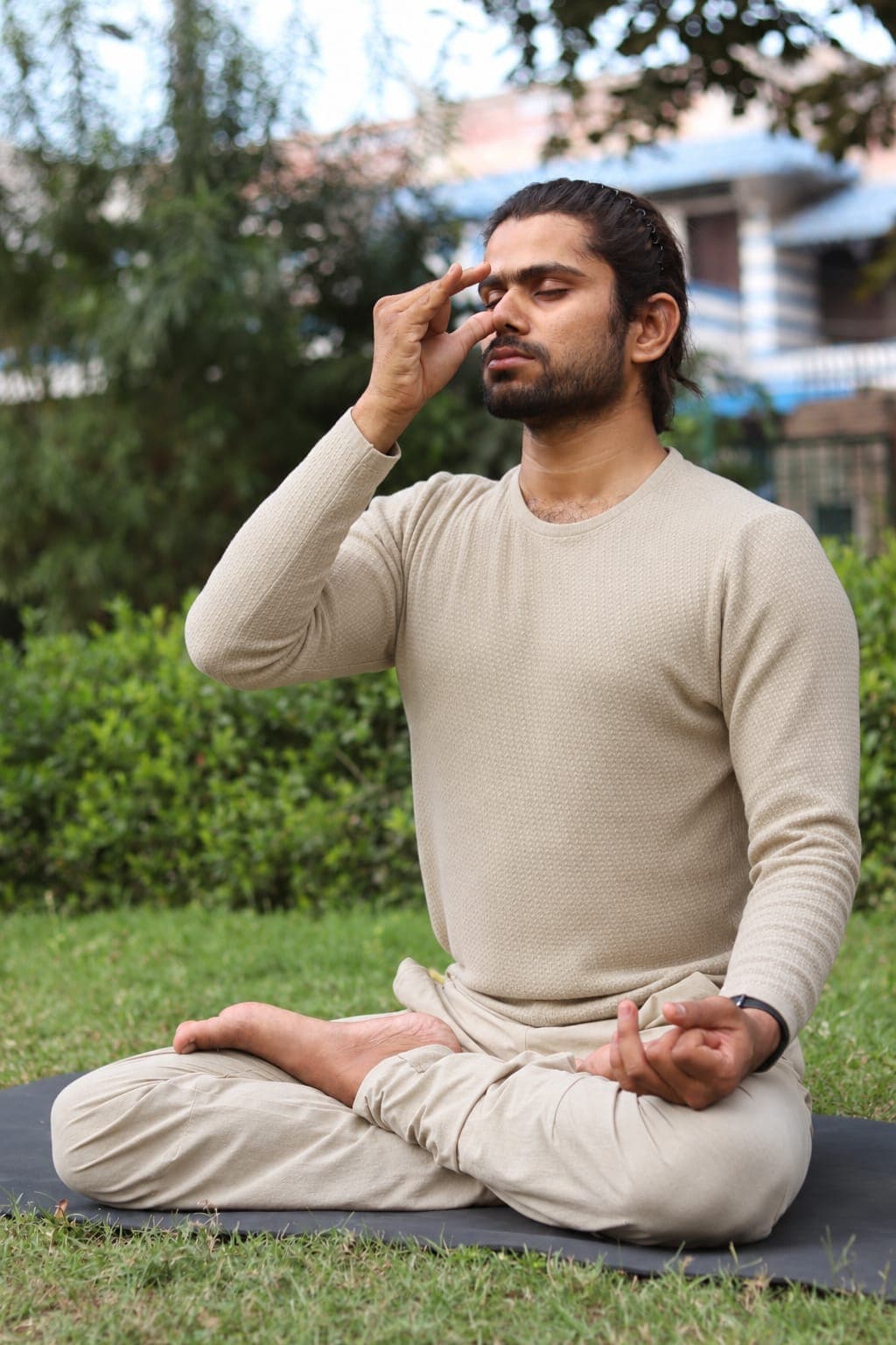Yogacharya Manish and Yogini Pooja seated in meditation