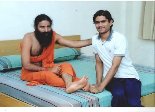 Yogacharya Manish practising alongside his teacher